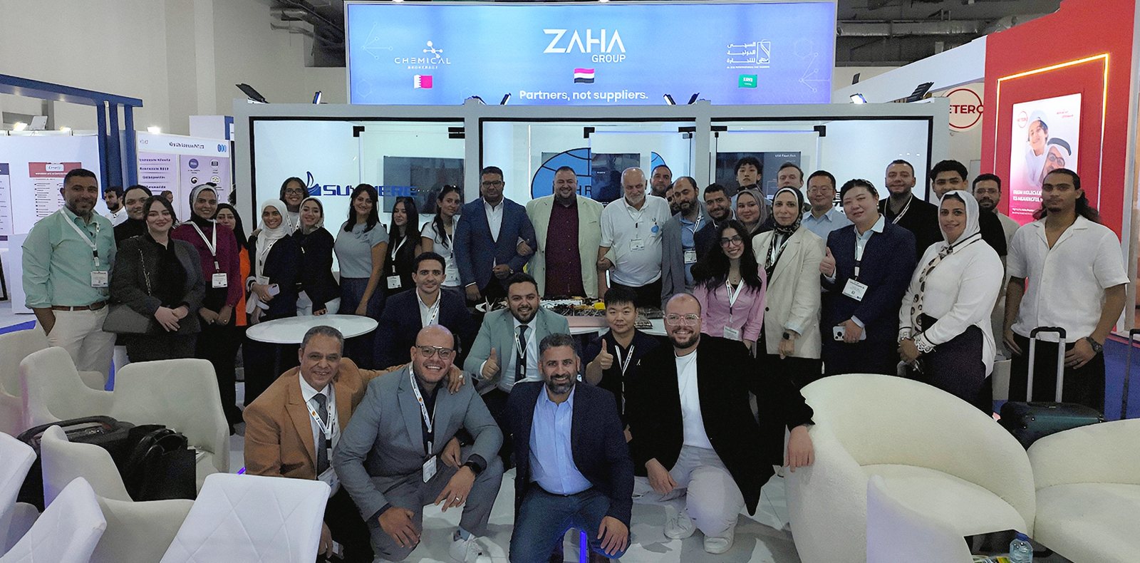 The ZAHA Group team with partners and visitors on stand H3.J18 at Pharmaconex 2026